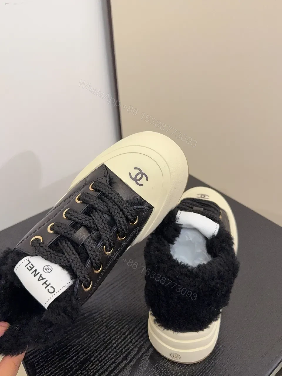 View 3 of Chic Leather High-Top Sneakers with Plush Warmth and Accents
