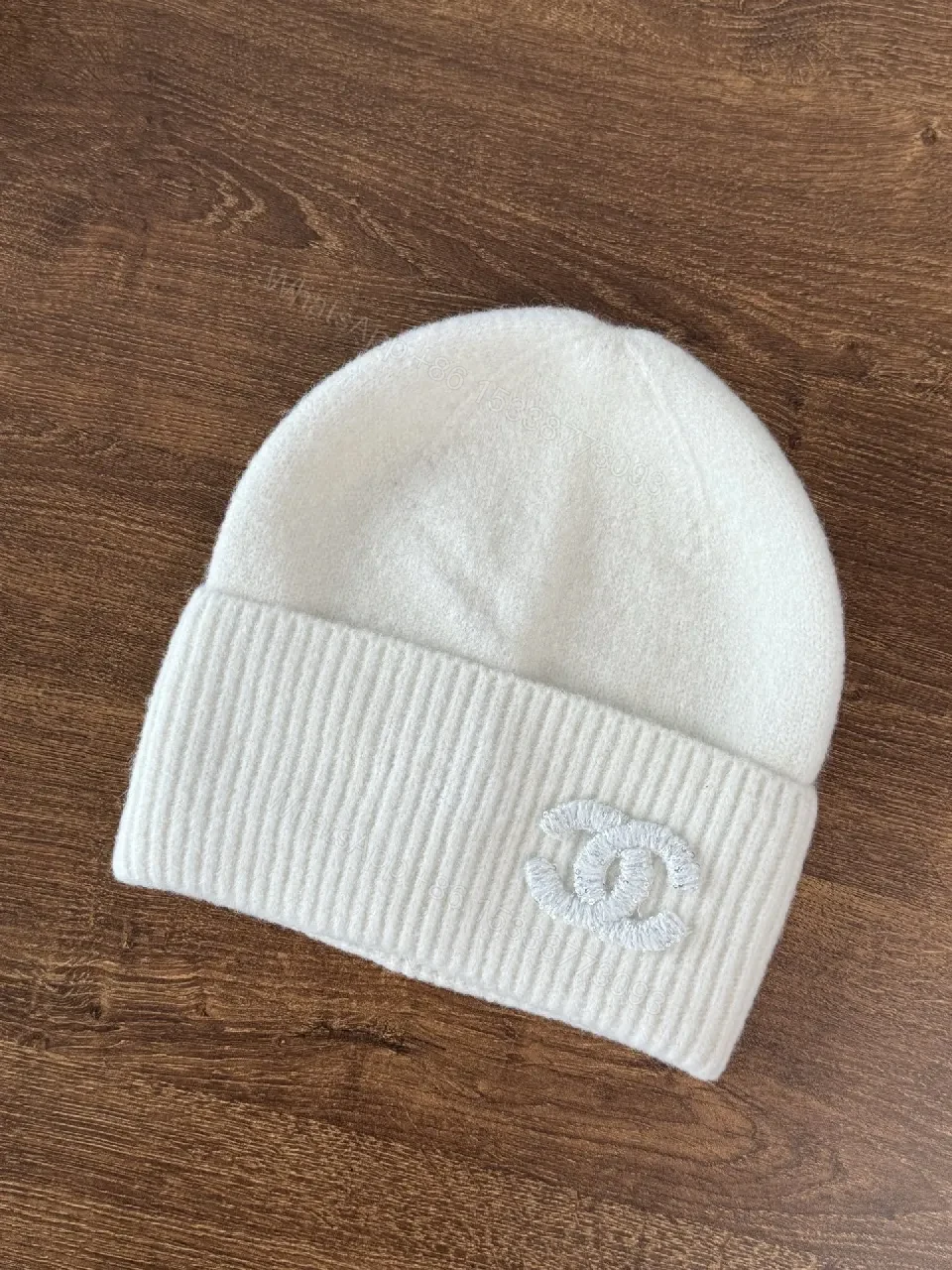 View 2 of Chic Minimalism Beanie: Off-White Knit, Embroidered Logo, Everyday Luxury