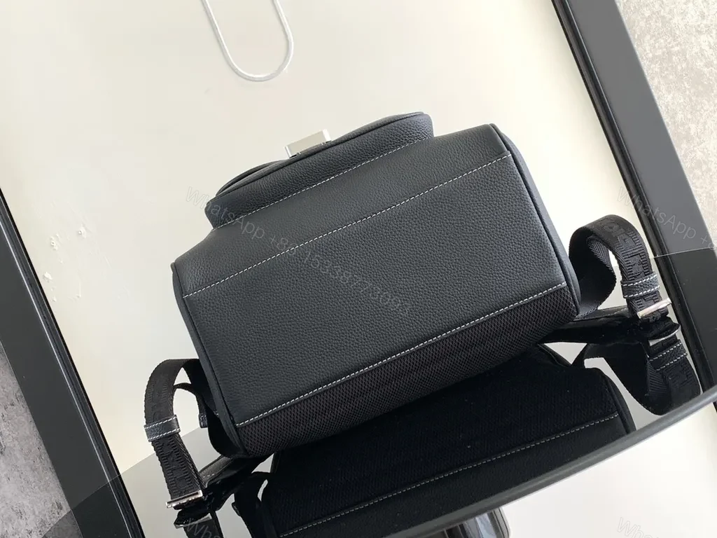View 3 of Dior Textured Leather Backpack: Structured Luxury Everyday Carry