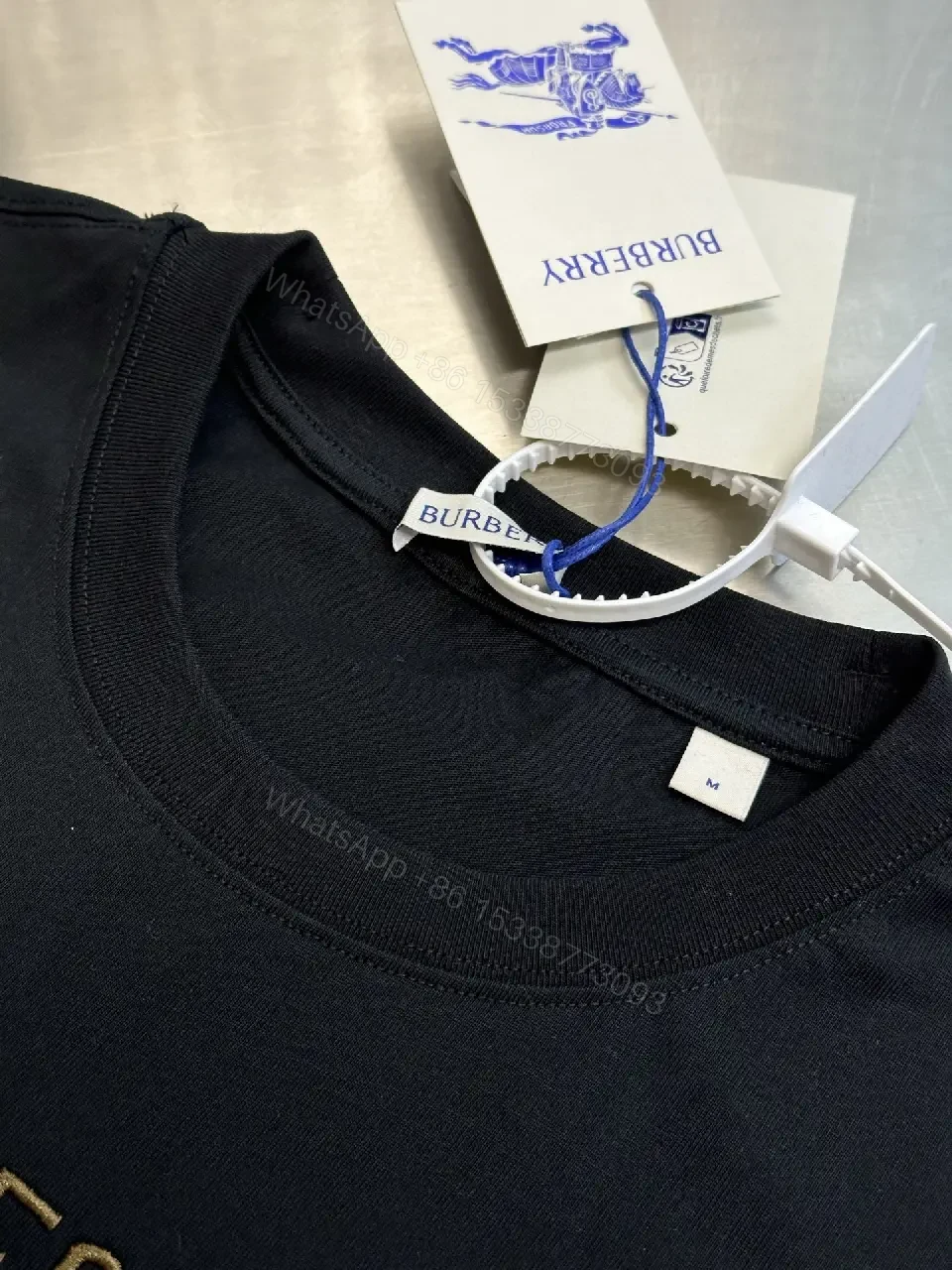 View 3 of Oversized Black Tee with Crest – Premium Cotton, Luxe Casual Tee