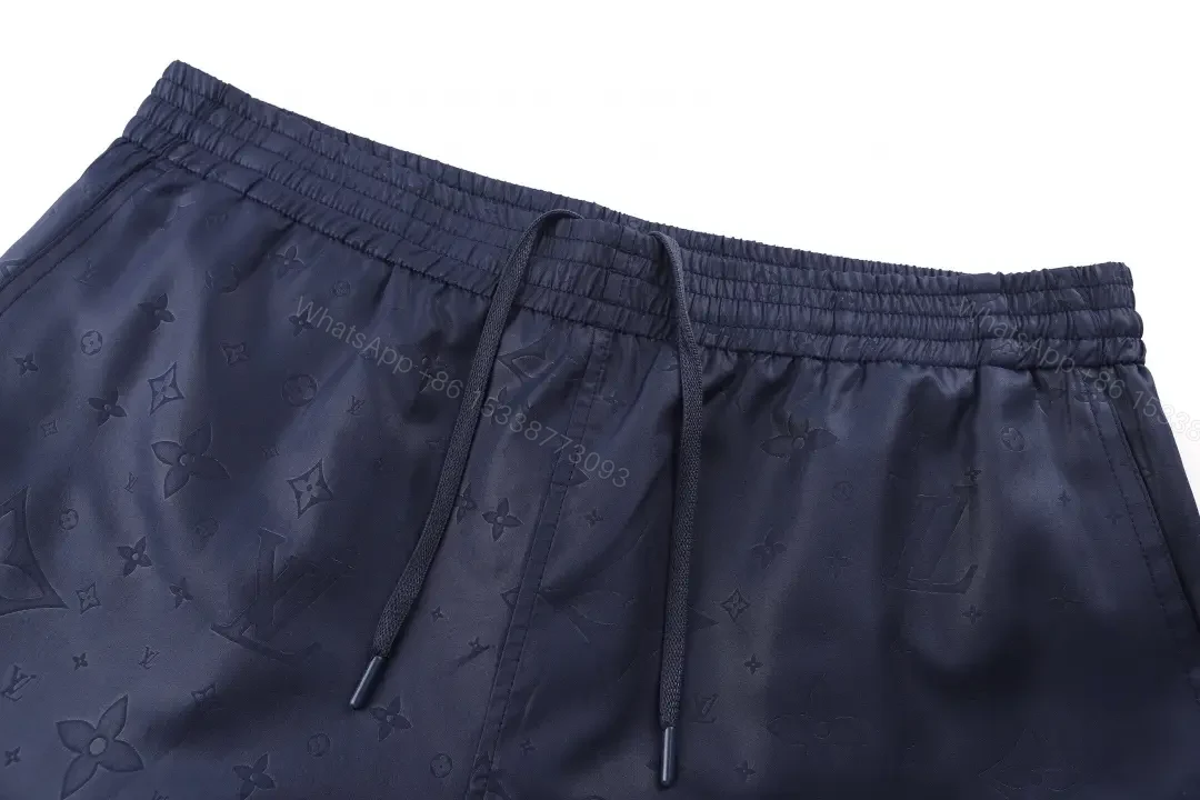 View 2 of Blue Leather-Look Louis Vuitton Monogram Print Shorts