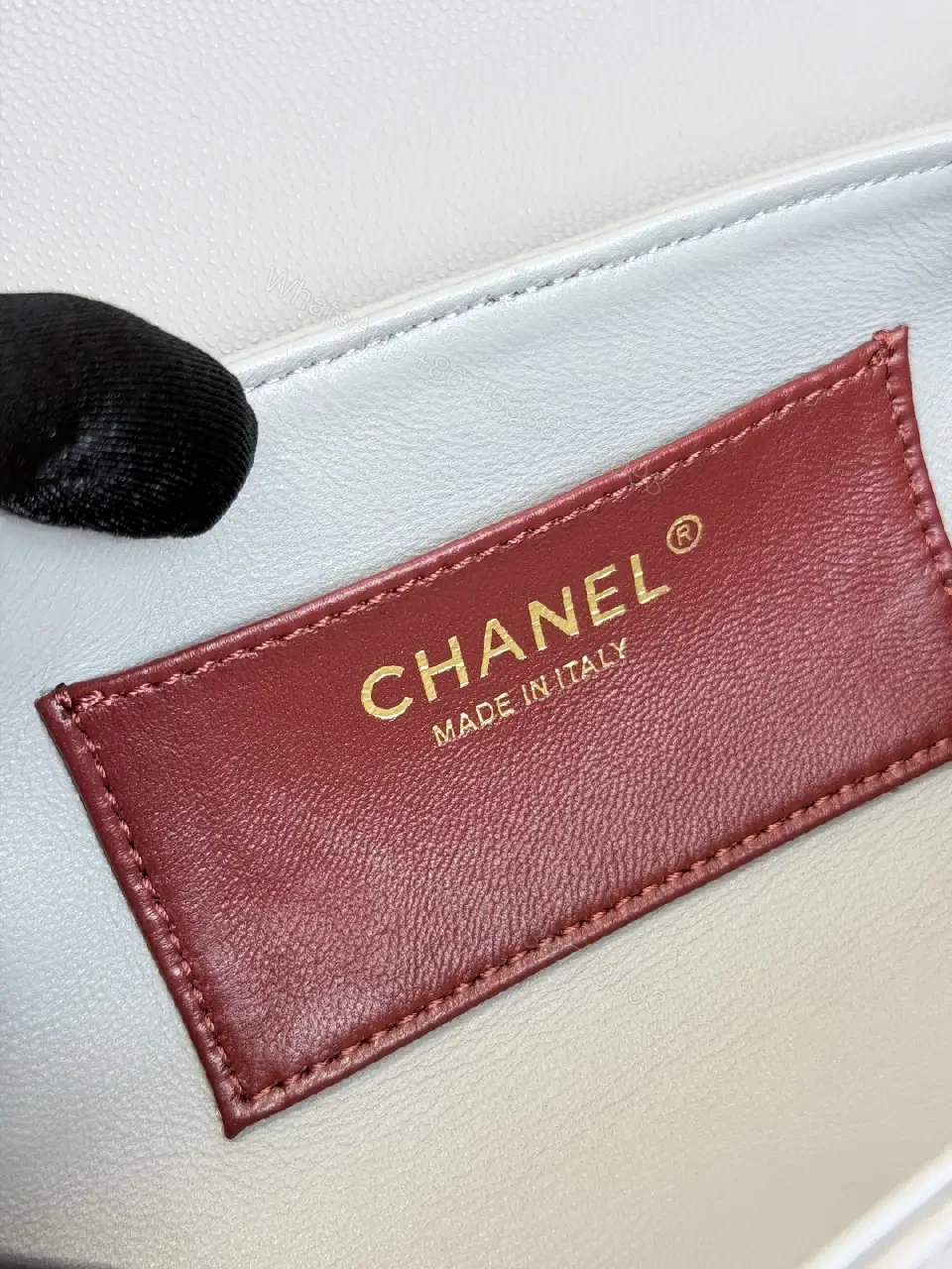 View 2 of Textured Leather Mini Bag – Slim Gold Logo, Gray