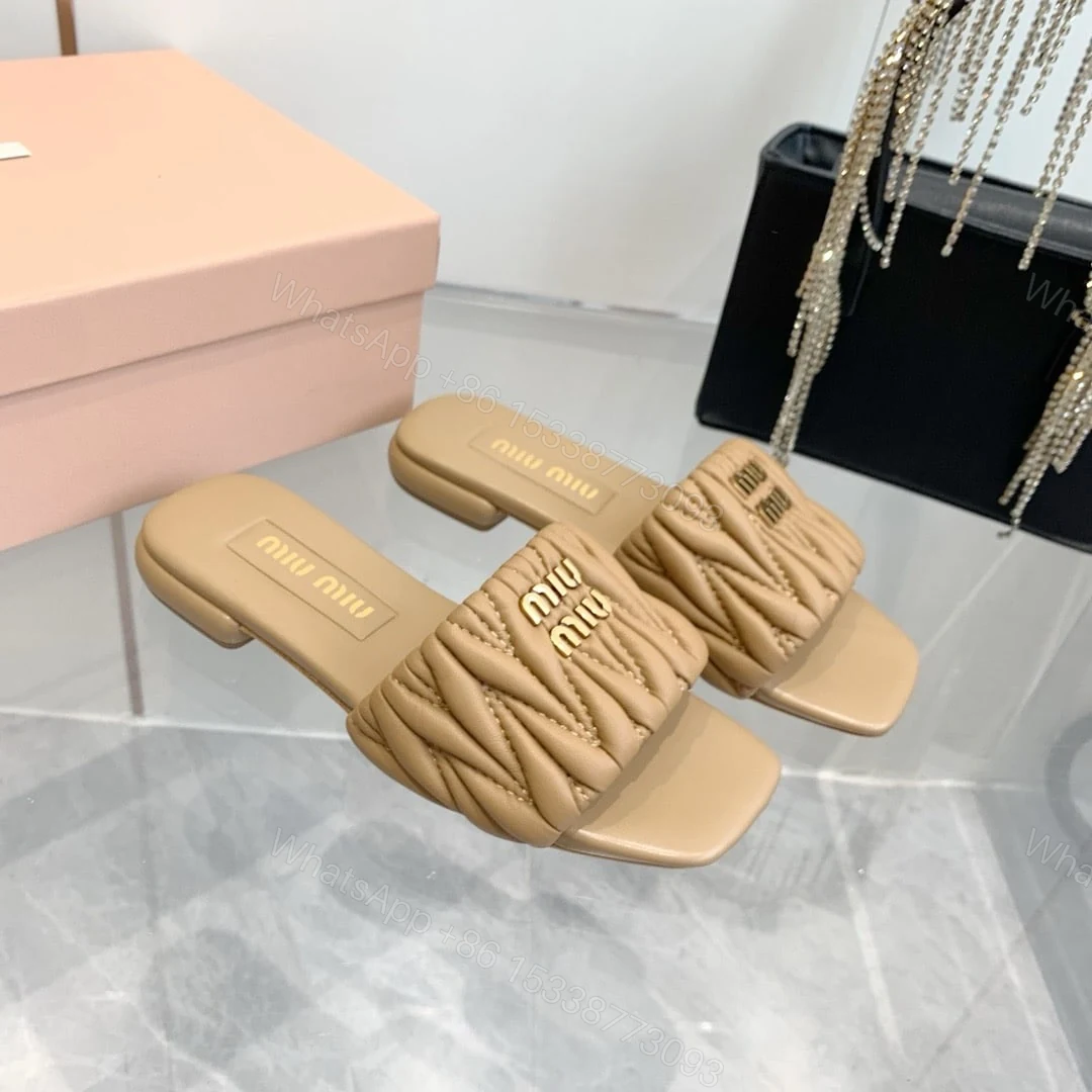 View 3 of MIUMIU MATELASSÉ NAPPA LEATHER SLIDES SAND BEIGE 5XX605 88T F0036 F 010