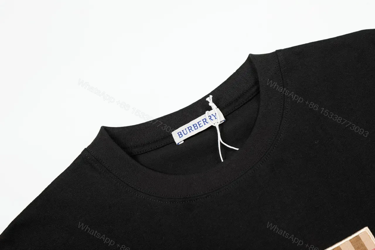 View 4 of Bold Logo Tee: Black Cotton, Modern Streetwear, Plaid Logo, Tee