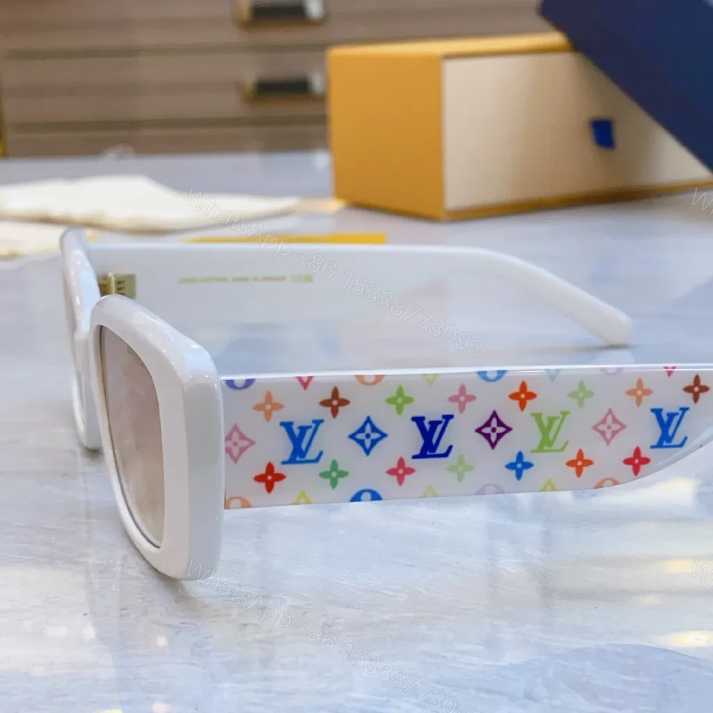 View 4 of Pink Frame Sunglasses with Multicolor Strap — Bold Luxury Sunnies