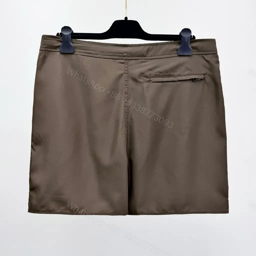 View 3 of Brown Nylon Casual Shorts Louis Vuitton Logo Patch Shorts