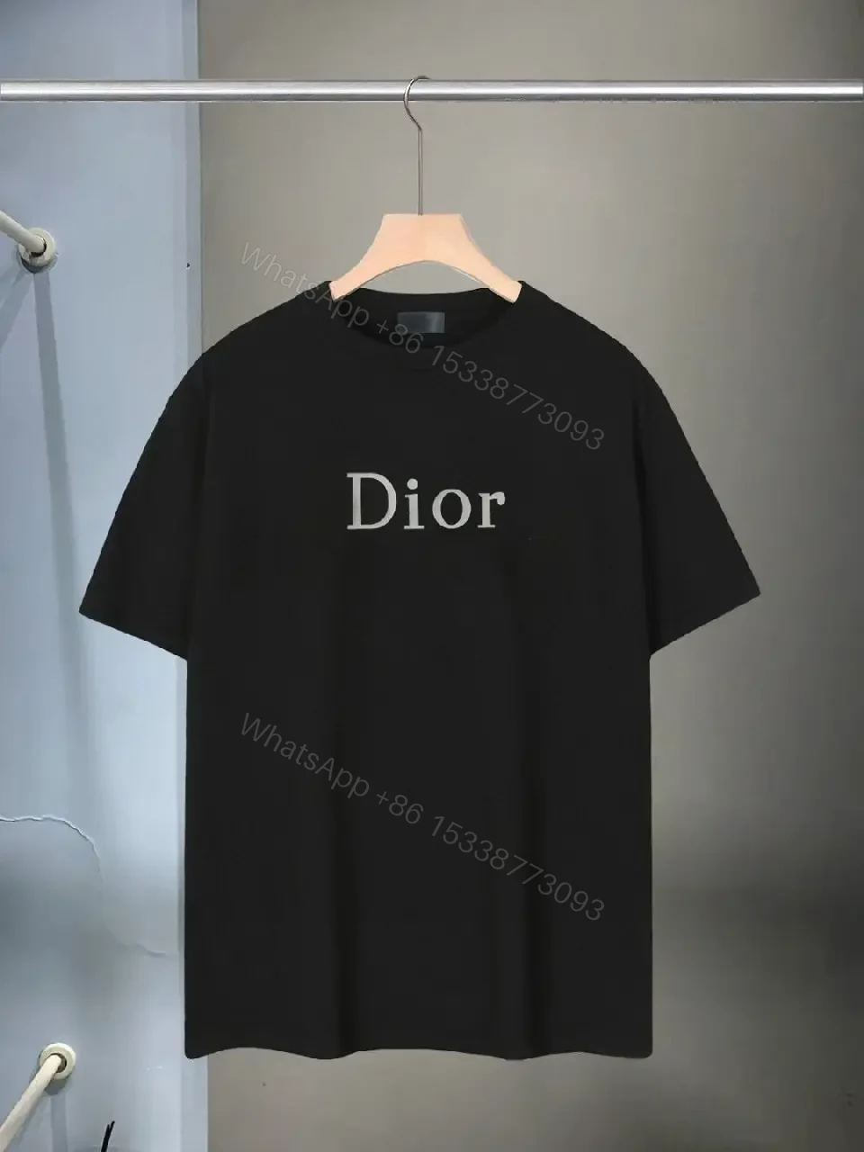 View 12 of Minimalist Black Knit Tee with Dior Logo Print, Unisex Fit