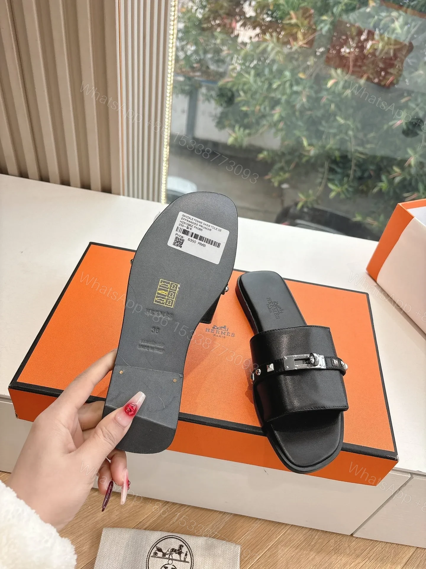 View 2 of Hermes Women Black Leather Slide Sandals