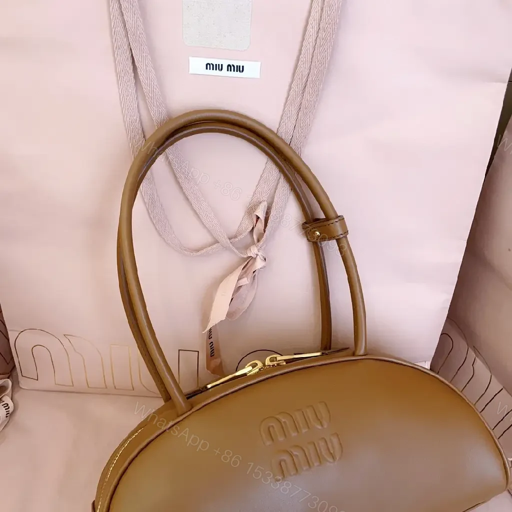 View 2 of Caramel Leather Dome Bag: Structured Luxury, Minimal Detailing