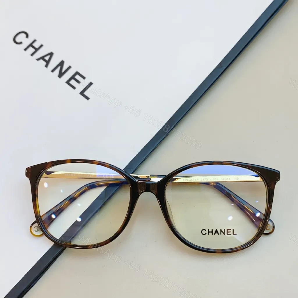 Patterned Frame, Visible Hardware, Classic Tort: Sophisticated Eyewear — view 1