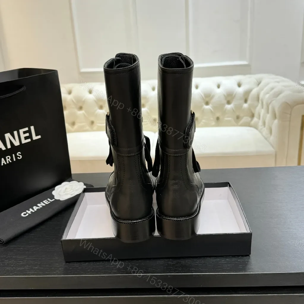 View 9 of Chic Black Combat Boots with Gold Detailing - High-Top Style