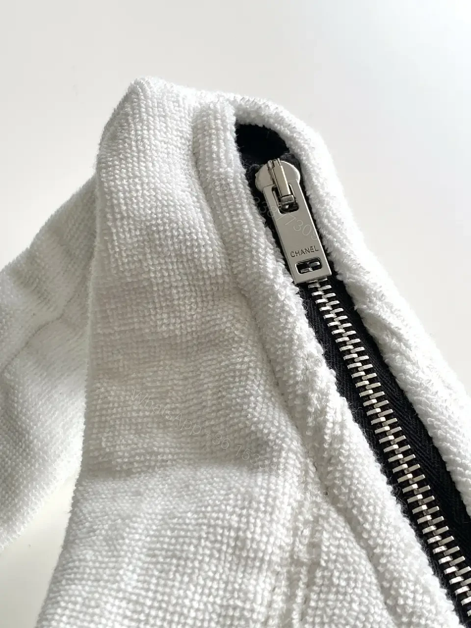 View 7 of White Fabric Handbag with Black Trim Slouchy Style Chanel Logo Tote