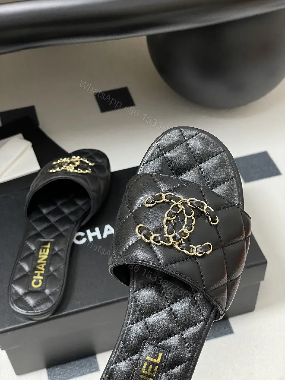 View 3 of Quilted Leather Slides with Gold Chain Detail Luxury