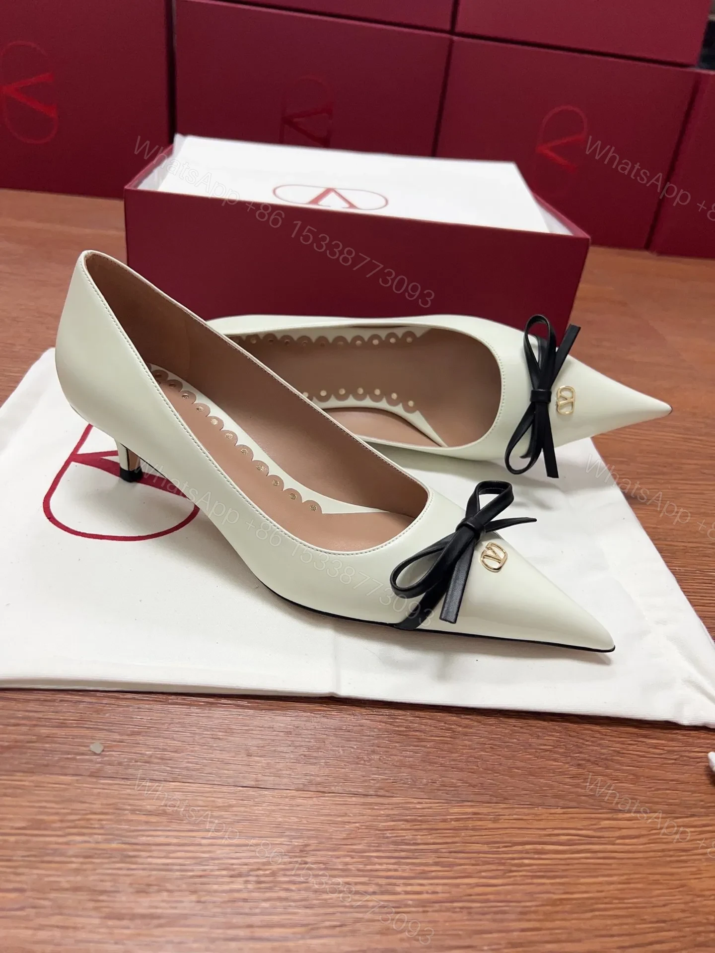 View 6 of Valentino Women Ivory Leather Bow Accent Pumps