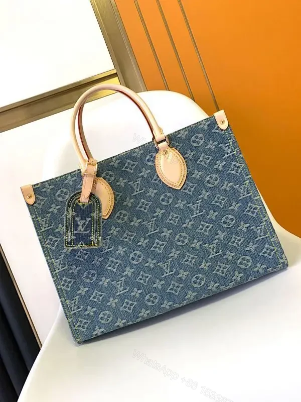 Denim Monogram Tote: Premium Denim Leather-Trim Tote with Signature Details — view 1