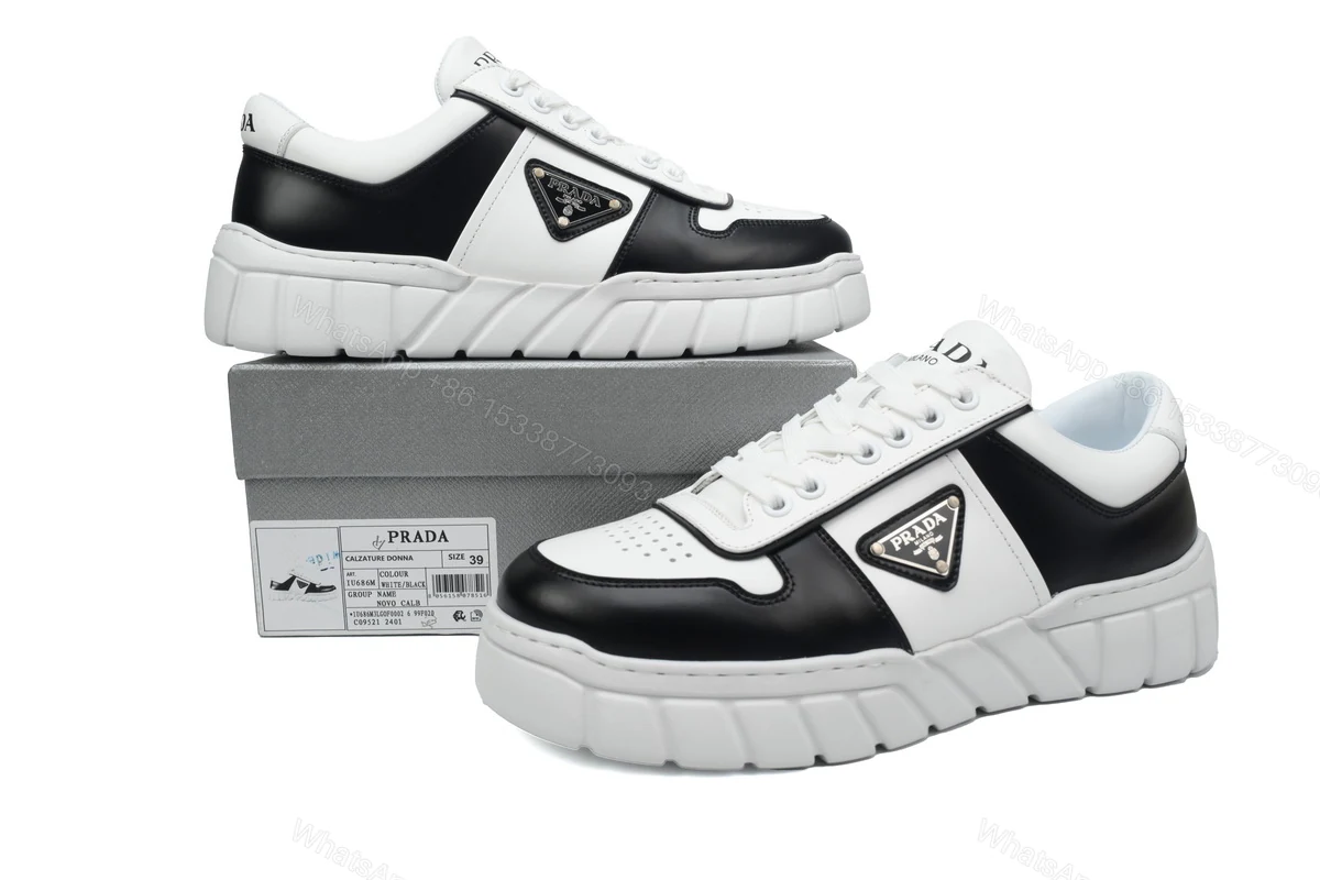 View 2 of Prada Low-Top Sneakers Serrated Black And White
