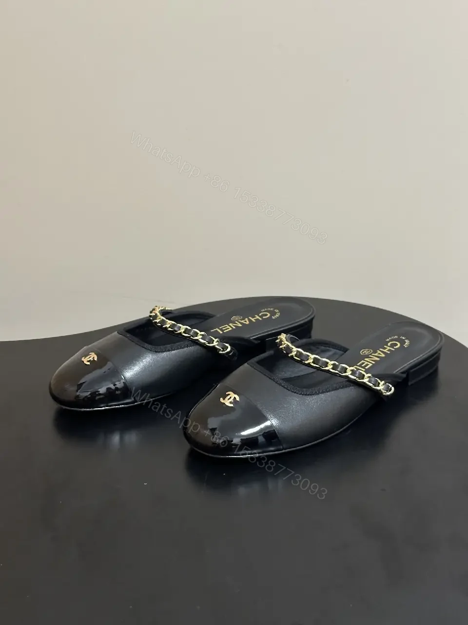 View 10 of Black Leather Flat Mules Chain-Detail Chanel-Style Slippers