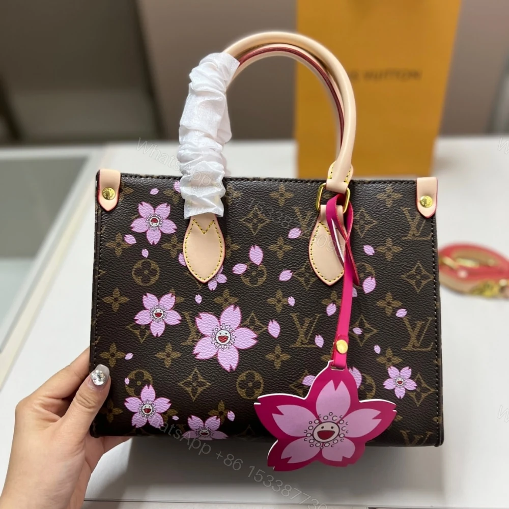 View 2 of Louis Vuitton X Takashi Murakami Onthego PM Sakura Brown 25Cm M13269