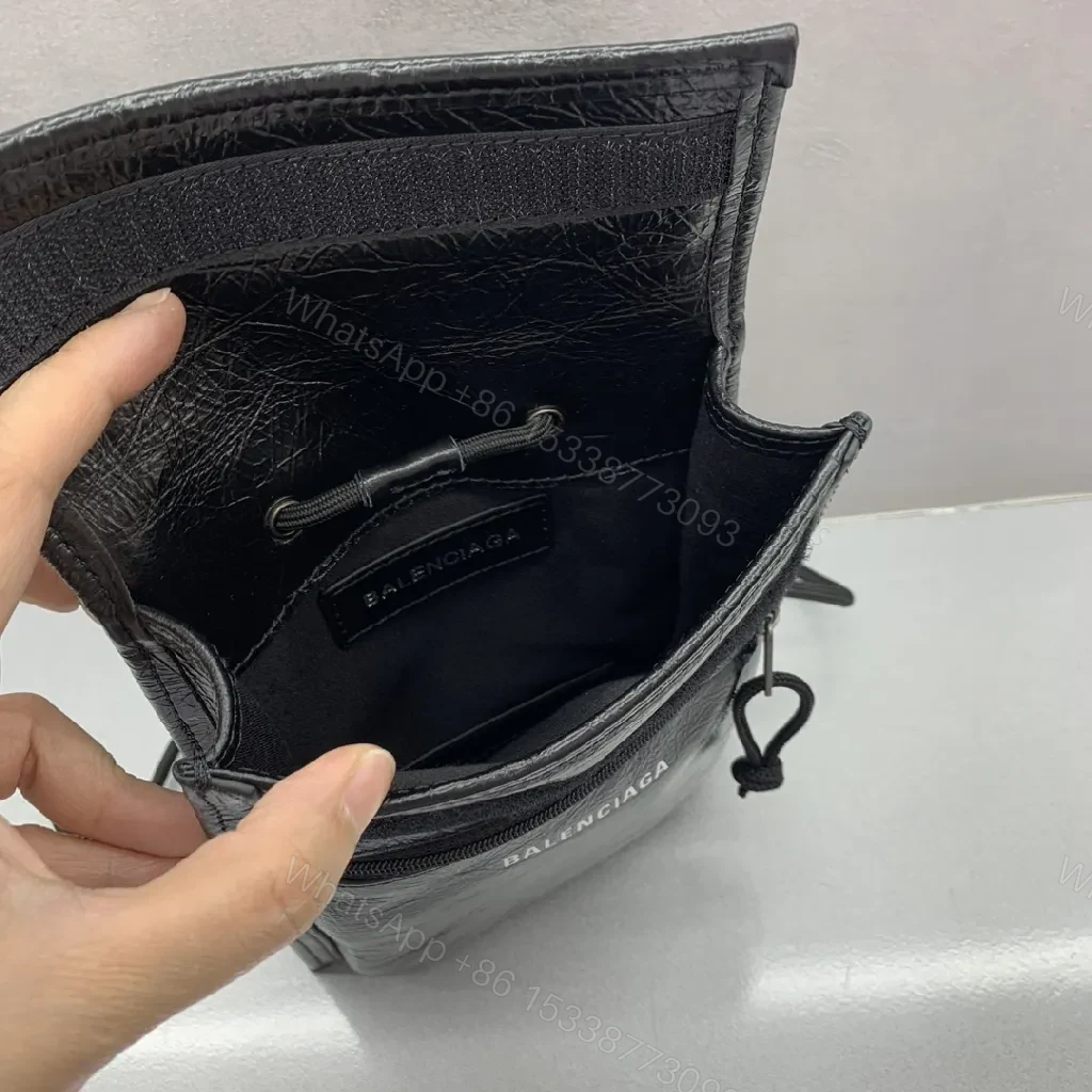 View 3 of Compact Black Leather Crossbody: Modern Texture, Ultra-Functional
