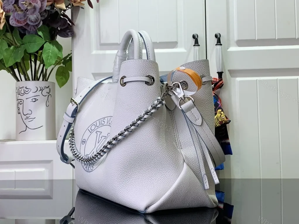 View 7 of Pebbled Leather Tote: LV Emblem, Structured, Spacious Carrier