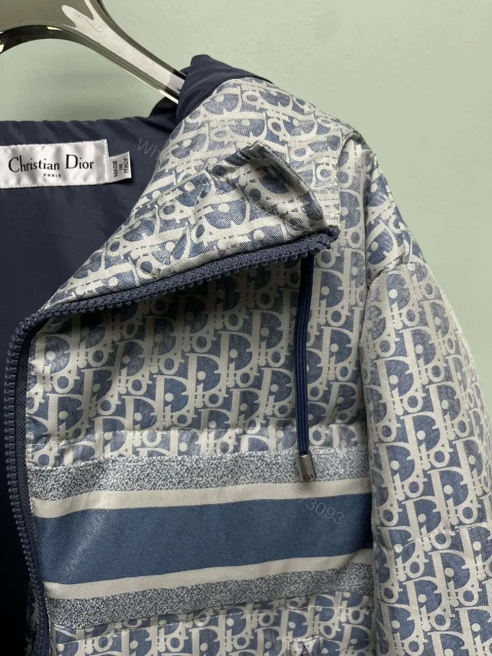 View 3 of Monochrome Puffer Jacket: Monogram Texture, Modern Warmth, Street-Ready Outerwear