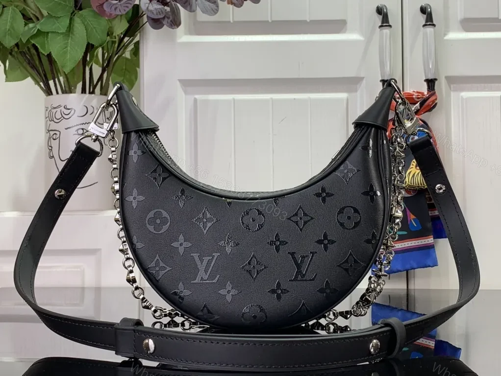 Hologram Monogram Crescent Bag: Modern Luxury, Versatile Carry — view 1