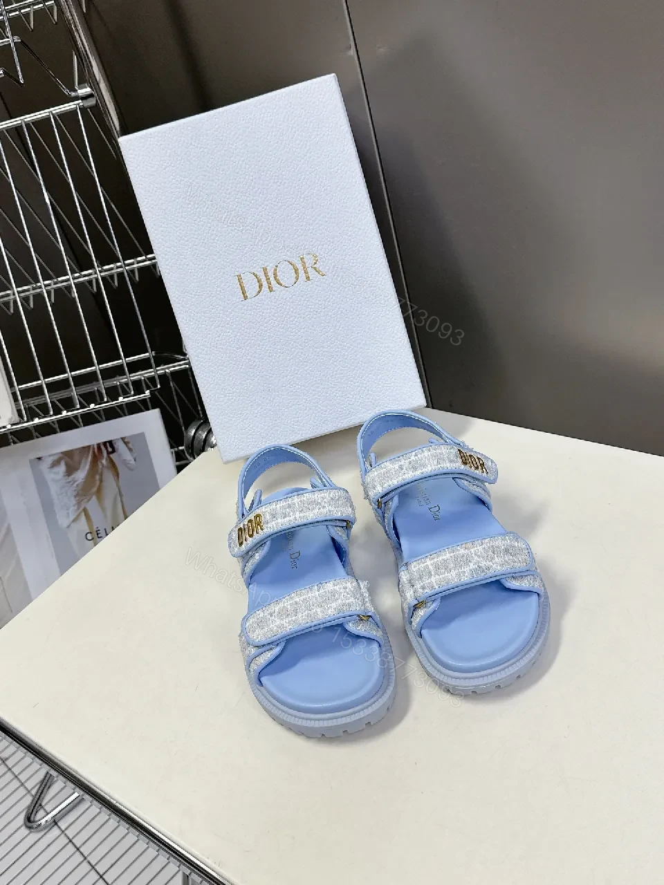 View 6 of Soft-Gleam Crest Sandals: Light-Blue Textured Straps, Minimal Logo