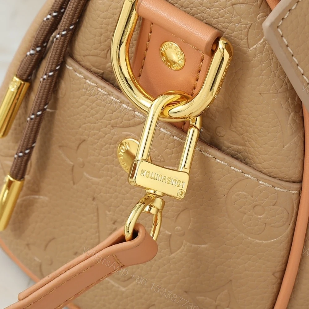 View 7 of Louis Vuitton Keepall Bandoulière 25 Bag Beige 25Cm M12627