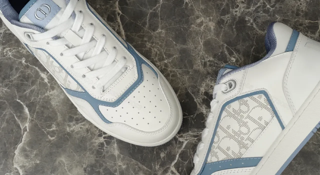 View 6 of Soft-White Leather Sneaker with Blue Accents and Signature Texture
