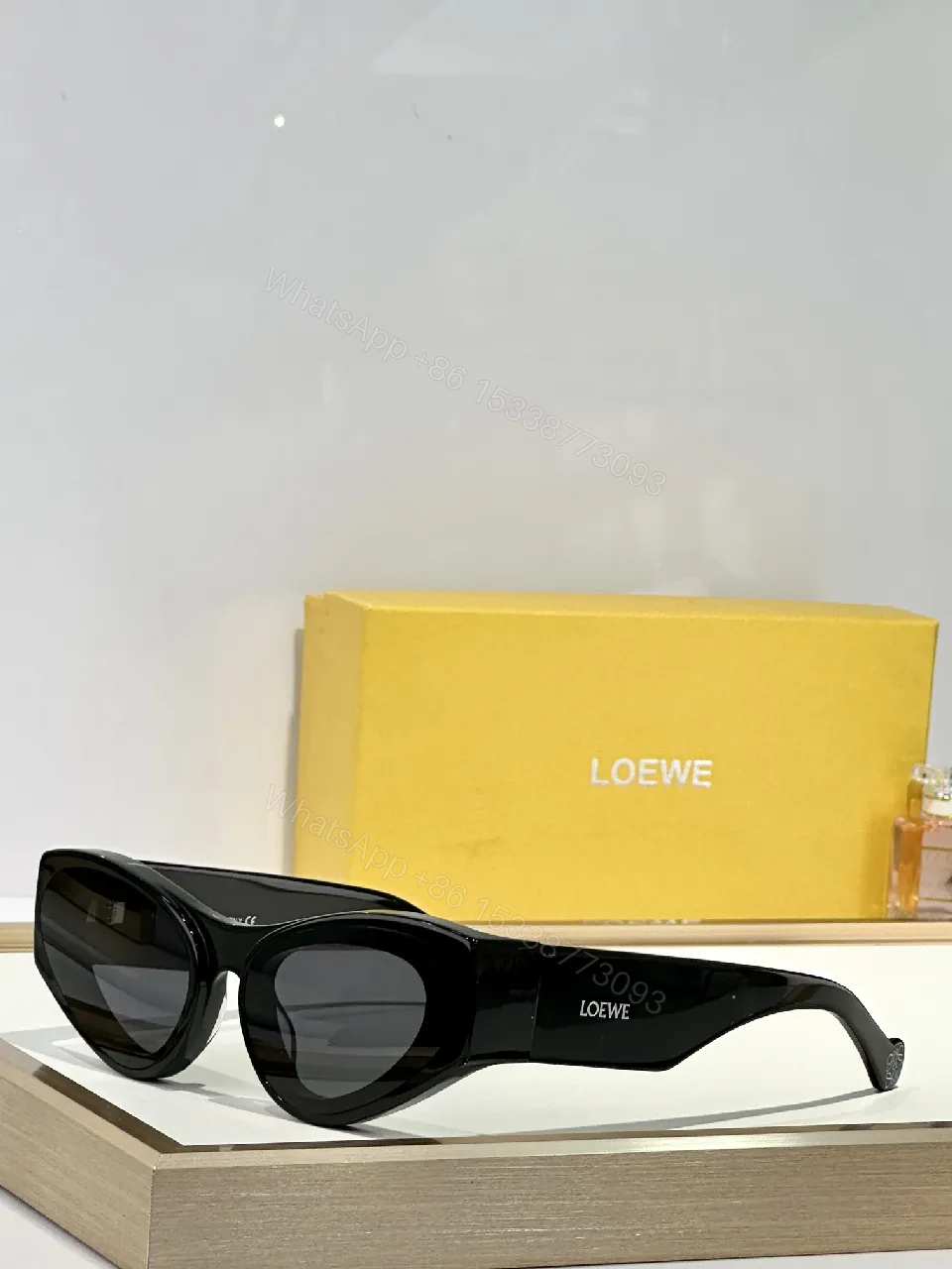 View 8 of Bold Black Acetate Cat-Eye Sunglasses with Polarized Yellow Lenses