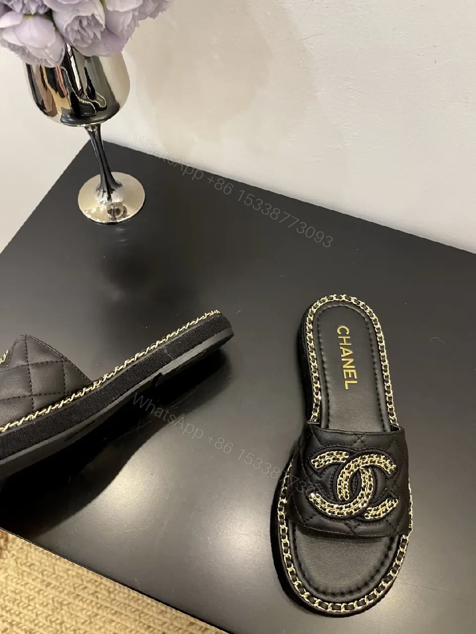View 2 of Black Leather Slip-Ons with Chain Detailing Sandals