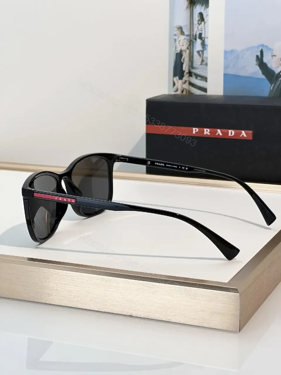 View 3 of Brown Tortoiseshell Sunglasses, Wayfarer-Inspired, Full-Frame, Mottled Pattern, Prada Logo Front