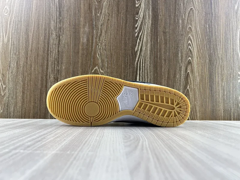 View 3 of Minimal White & Black Nike-Style Sneaker with Gum Sole