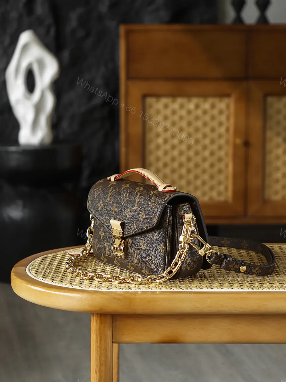 View 4 of Louis Vuitton Pochette Métis East West bag
