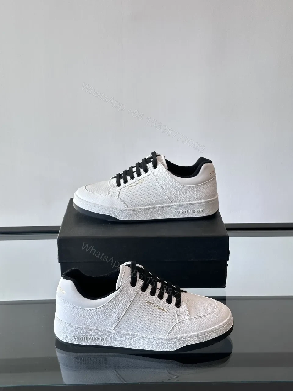 View 2 of White Leather Sneaker with Black Accents — Minimalist Luxury Sneaker