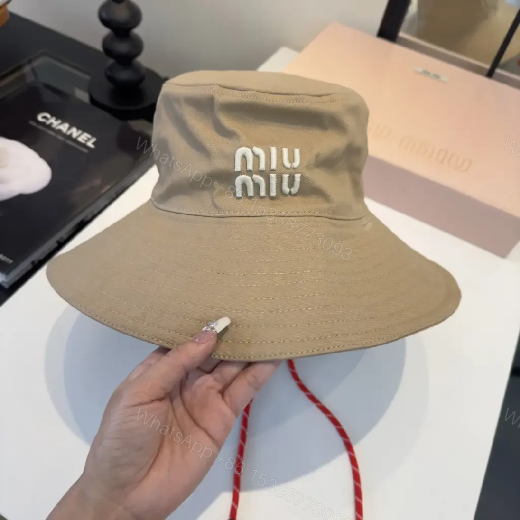 View 3 of Textured Beige Canvas Bucket Hat with Logo Detail