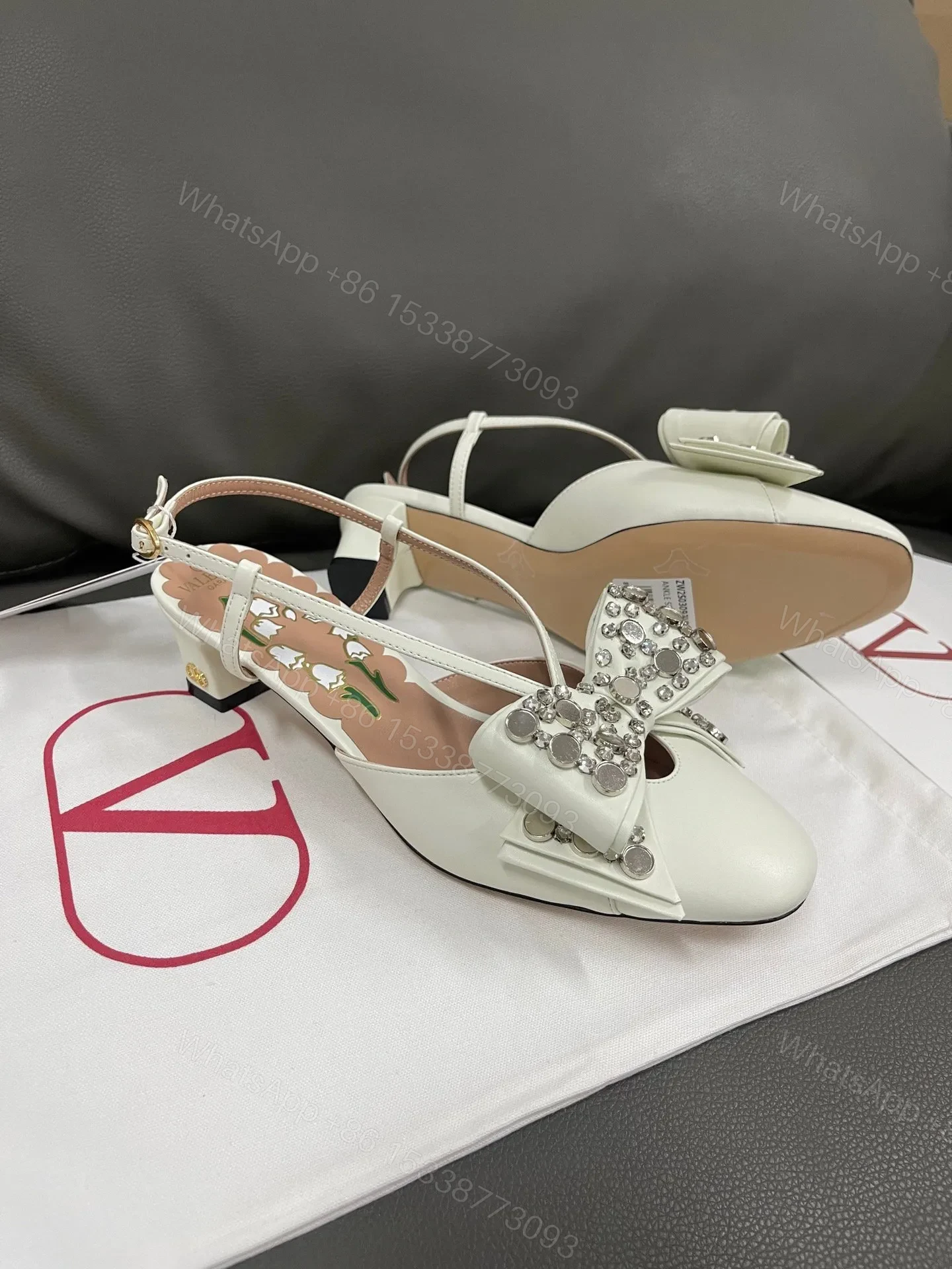View 3 of Valentino Women White Leather Bow Embellished Flats
