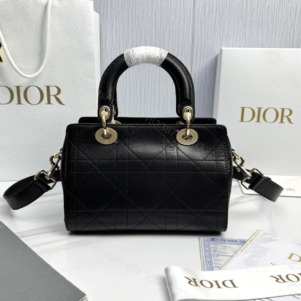 View 6 of Quilted Black Satchel: Gold Charm, Compact Luxury Bag