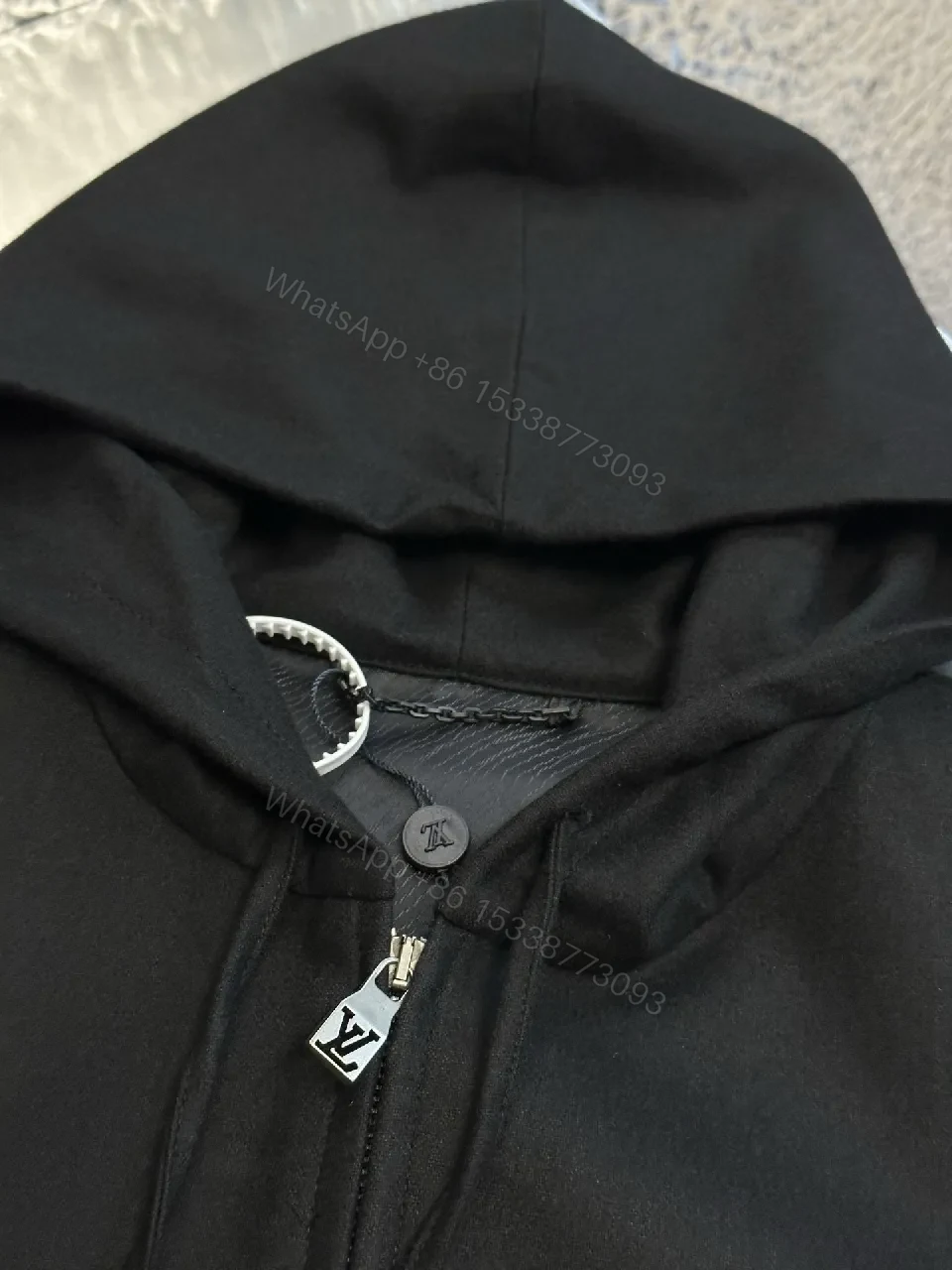 View 9 of Black Leatherette Minimal Zip Hoodie with LV Emblem