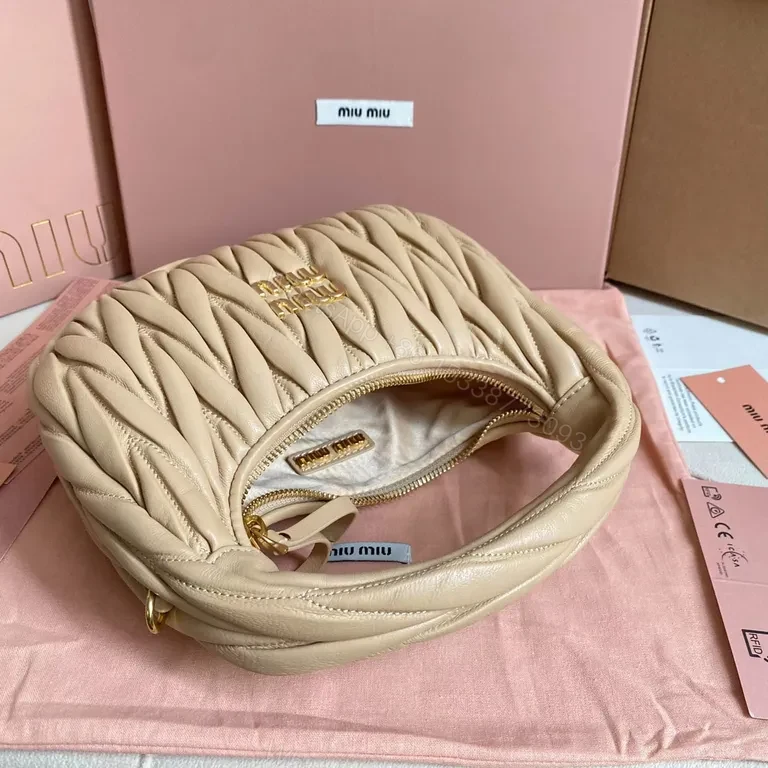 View 5 of Chic Quilted Leather Bag: Compact Luxury, Blush, Miu Miu Style