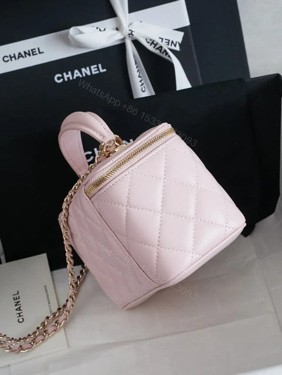 View 2 of Pastel Pink Quilted Mini Bag with Gold Hardware