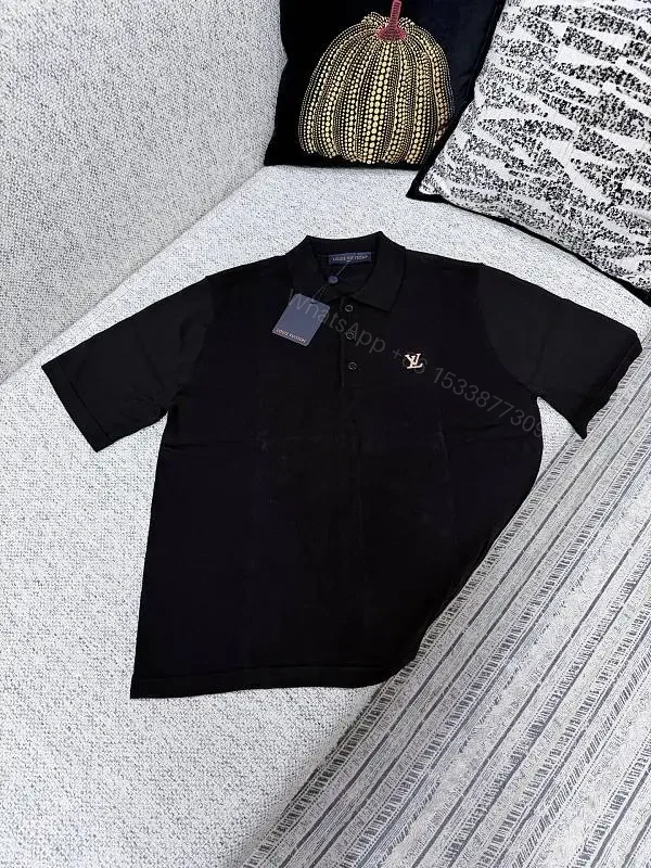 Black Polo with Subtle Gold Logo - Refined Everyday Versatility — view 1