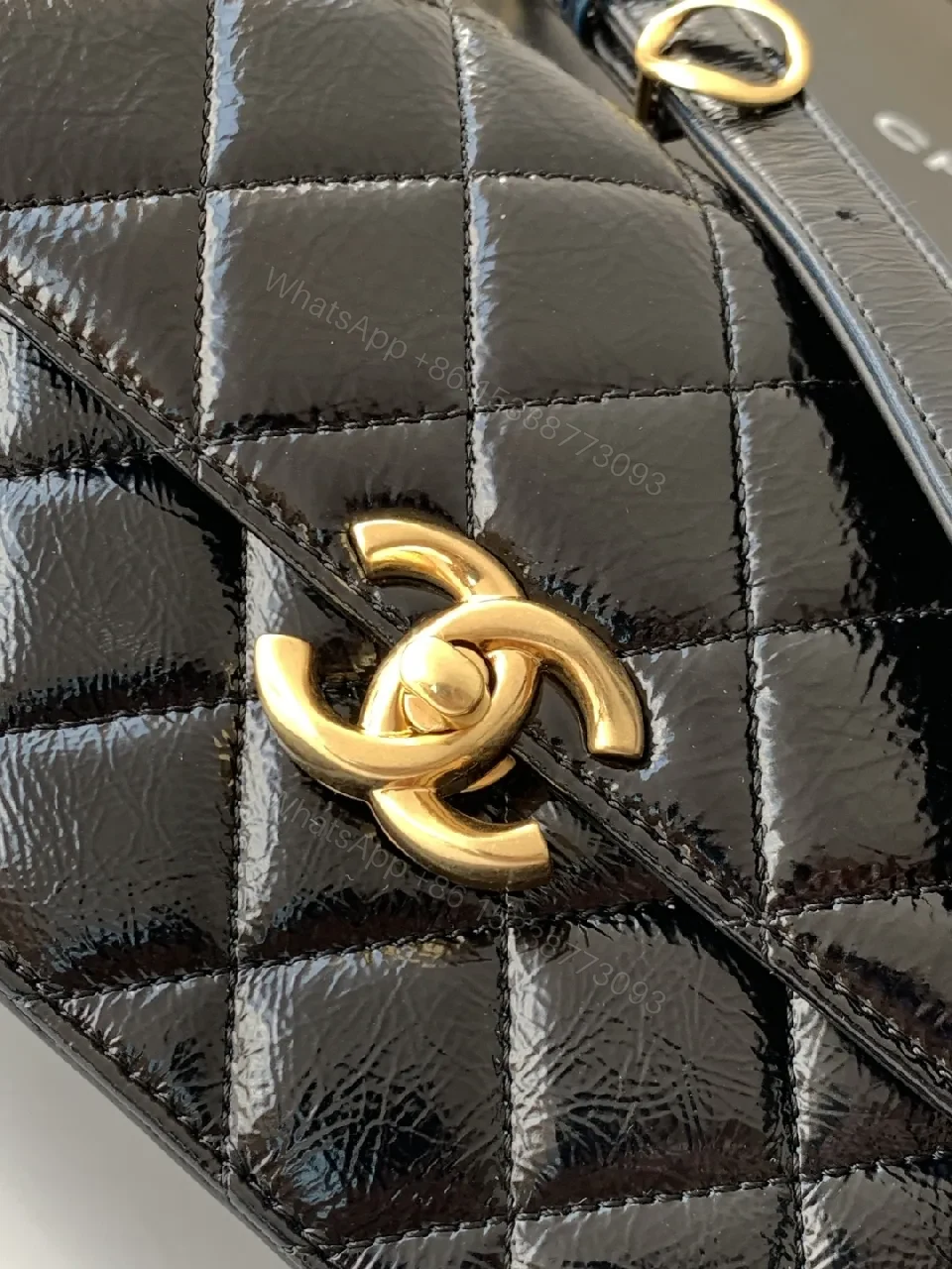 View 5 of Quilted Black Bag with Gold Hardware, Compact Shoulder Style