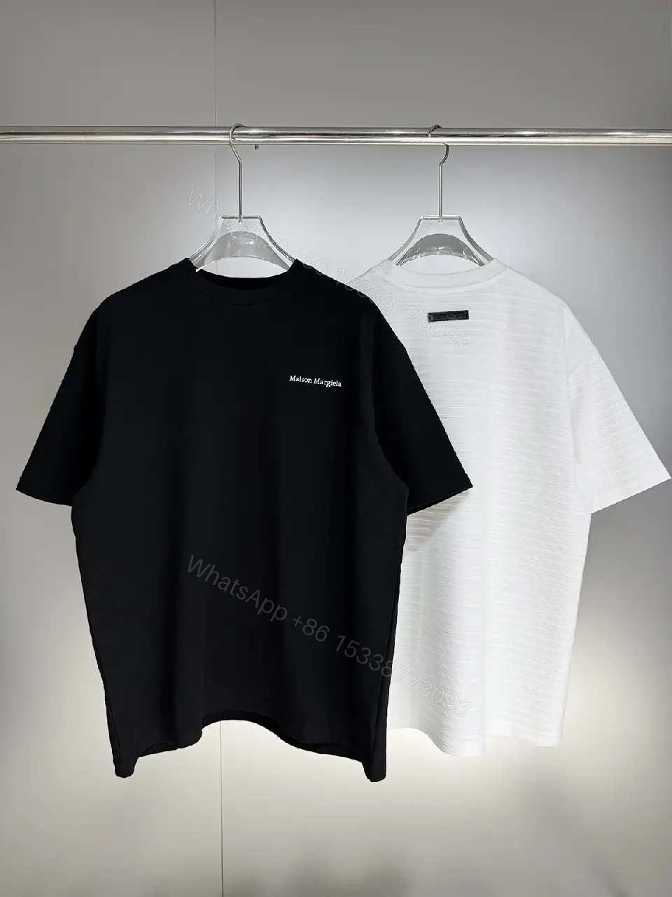 View 2 of Black Cotton Crewneck Tee + Minimalist Style + Subtle Logo + All-Day Comfort + T-Shirt