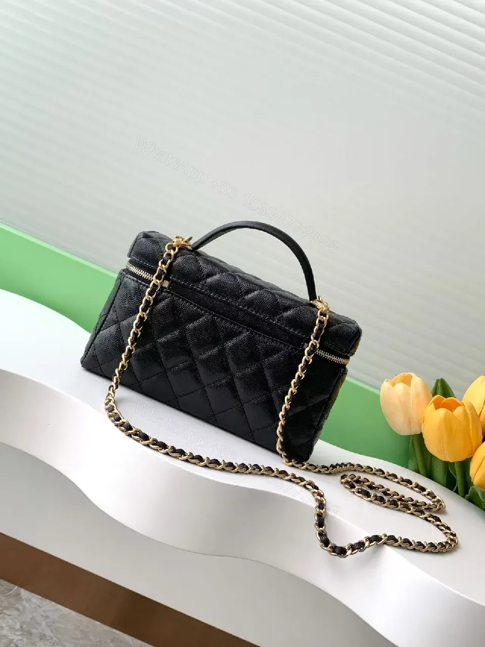 View 8 of Quilted Black Bag with Gold Hardware - Chic Compact Style