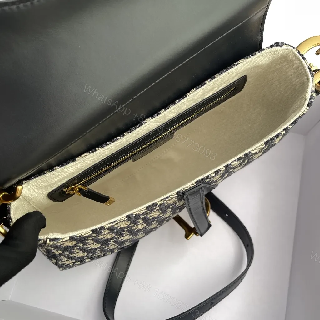View 2 of Chic Saddle Bag: Monogram Jacquard, Leather Trim, Gold Hardware, Everyday Versatility