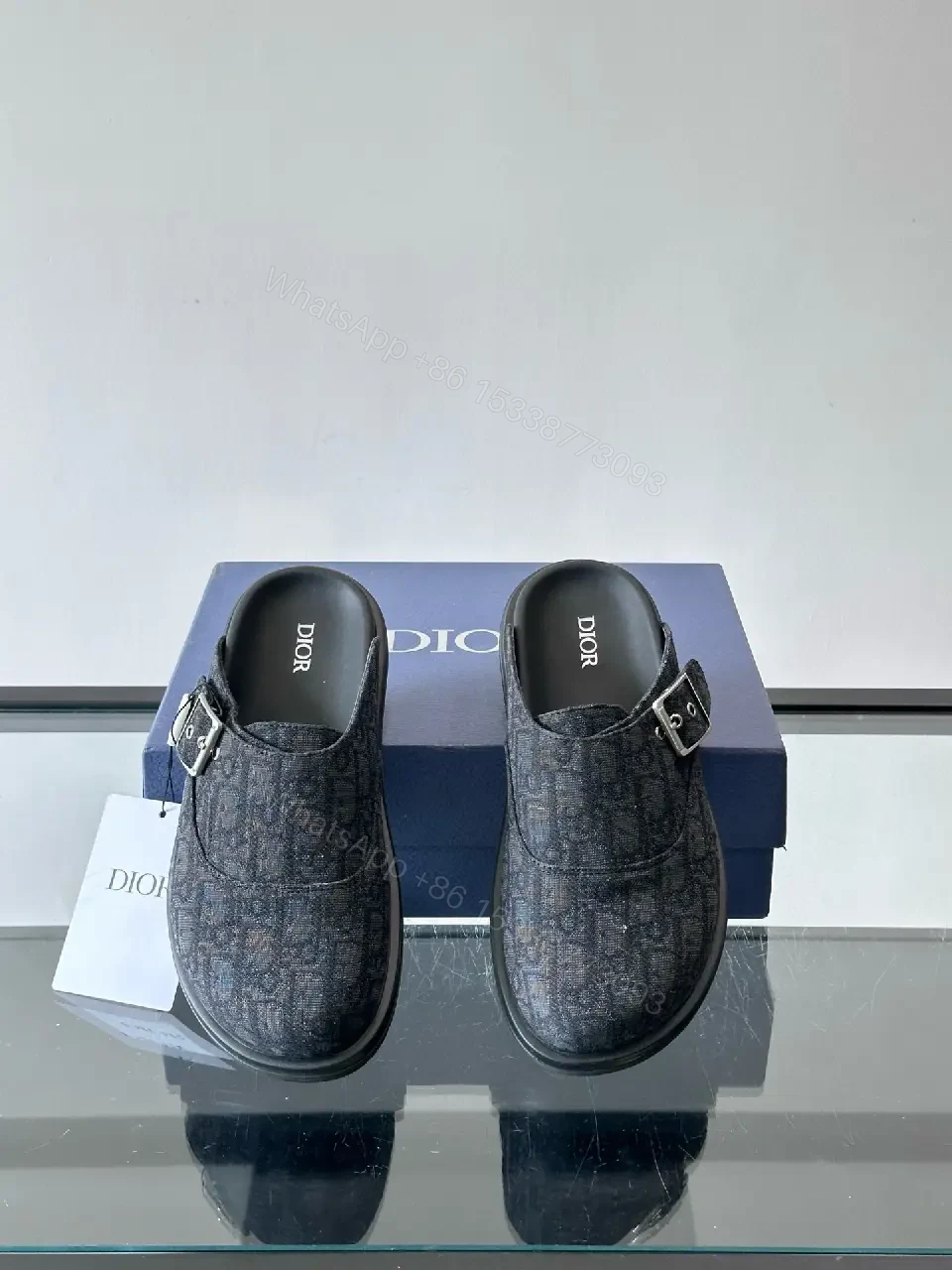 View 6 of Dark Monogram Slip-Ons: Textured Mules with Subtle Buckle