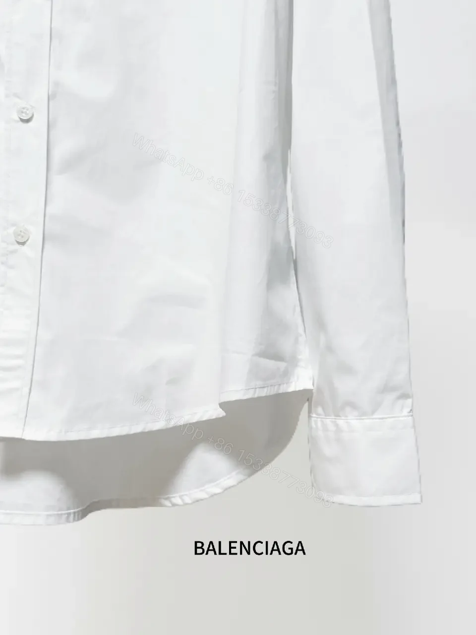 View 11 of Minimalist Button-Front Shirt with Subtle Logo Detail