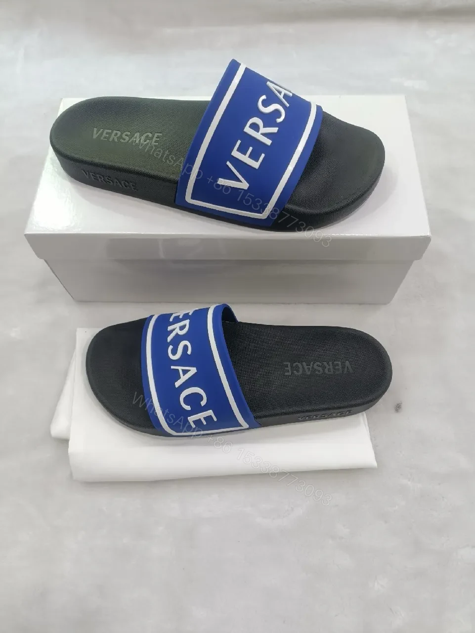 Bold Logo Stride Sliders: Blue-White Luxury Comfort Sandals — view 1