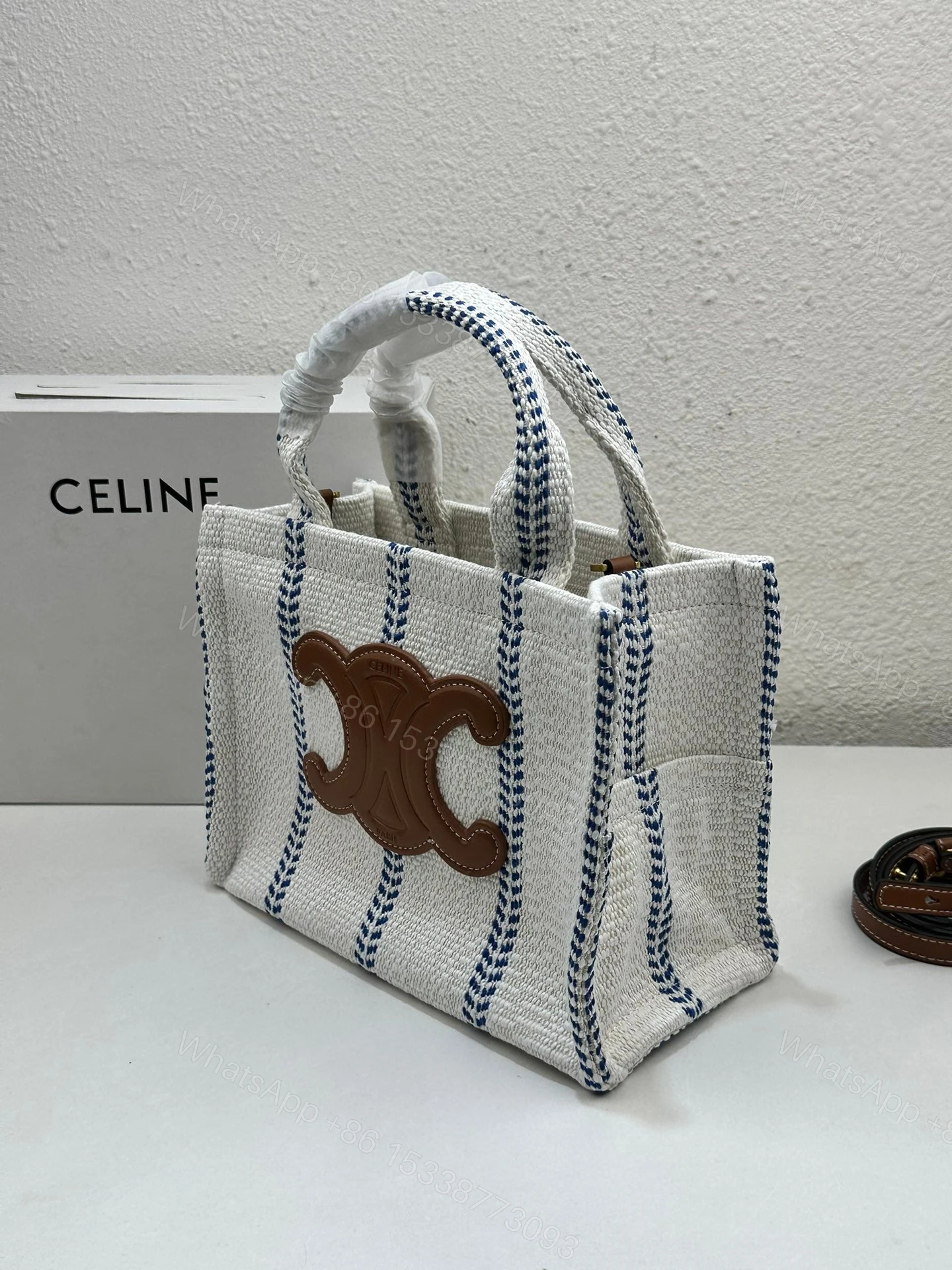 View 6 of CELINE SMALL CABAS THAIS IN STRIPED TEXTILE AND CALFSKIN XHITE/BLUE 25CM 199162EYI01BB